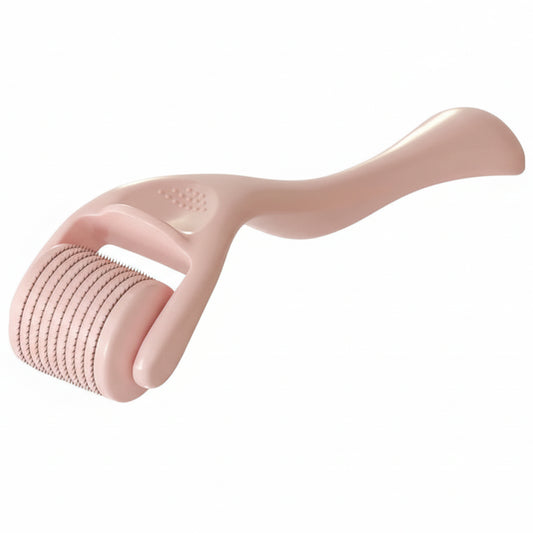 Pink roller tool on a white background